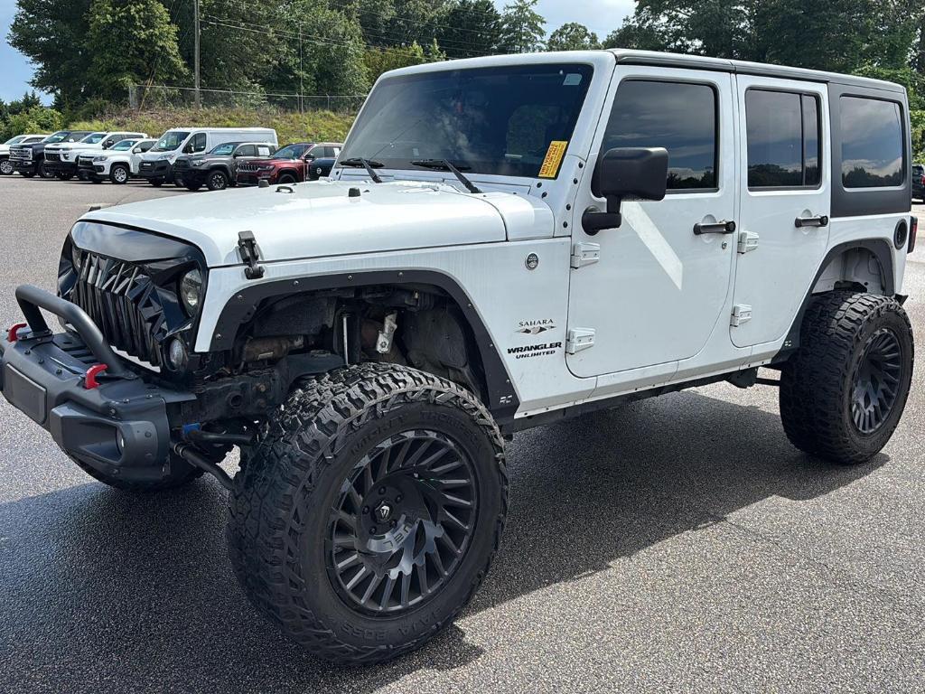 used 2016 Jeep Wrangler Unlimited car, priced at $22,774