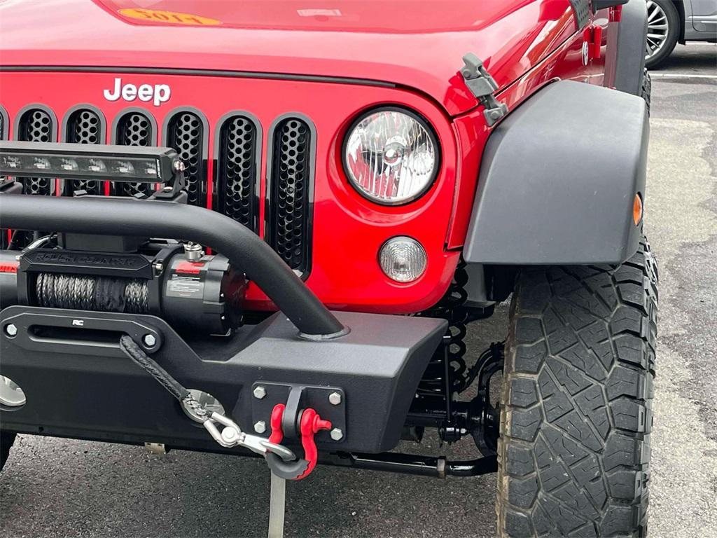 used 2014 Jeep Wrangler Unlimited car, priced at $14,004