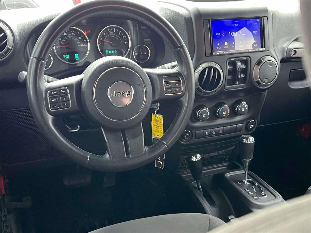 used 2014 Jeep Wrangler Unlimited car, priced at $14,004