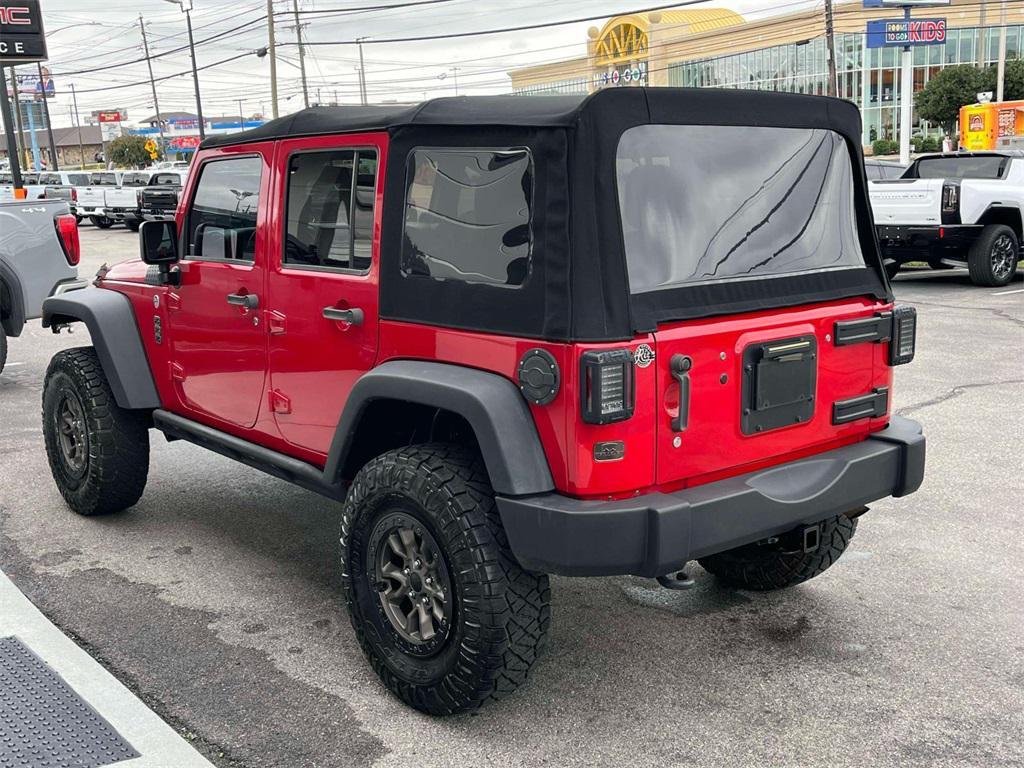 used 2014 Jeep Wrangler Unlimited car, priced at $14,004