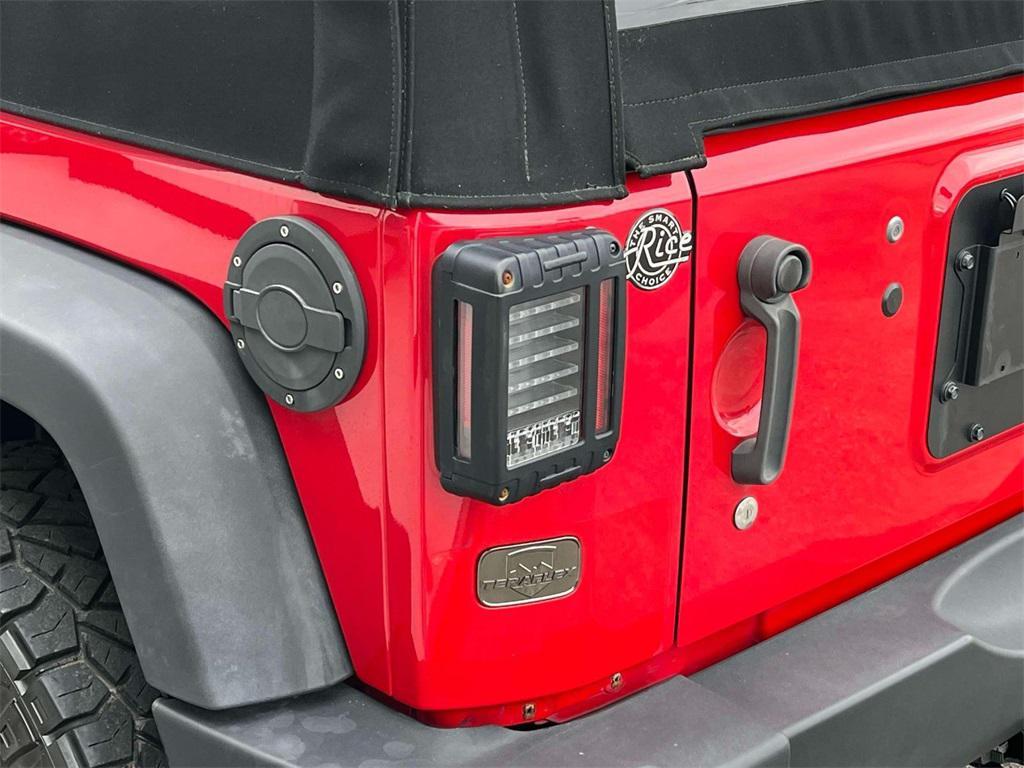 used 2014 Jeep Wrangler Unlimited car, priced at $14,004