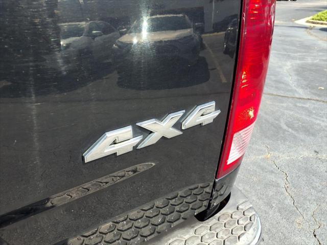 used 2015 Ram 1500 car, priced at $15,298