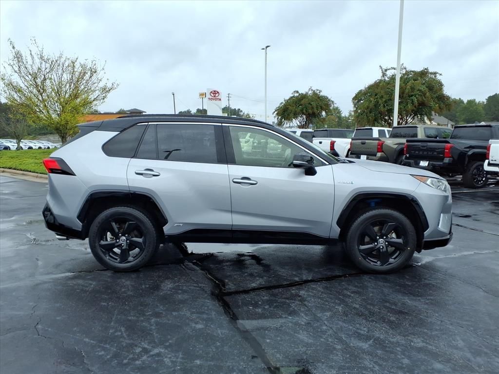 used 2021 Toyota RAV4 Hybrid car, priced at $29,480