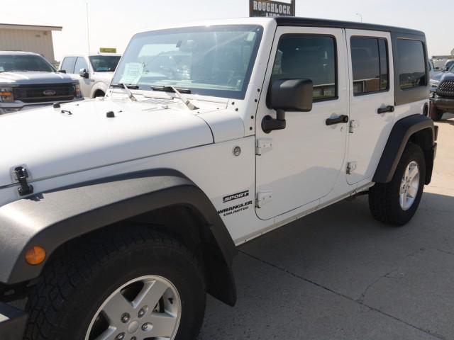 used 2013 Jeep Wrangler Unlimited car, priced at $14,172