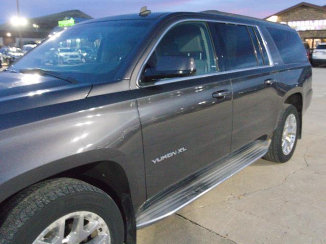 used 2015 GMC Yukon car, priced at $17,894