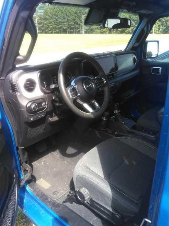 used 2024 Jeep Wrangler 4xe car, priced at $32,396