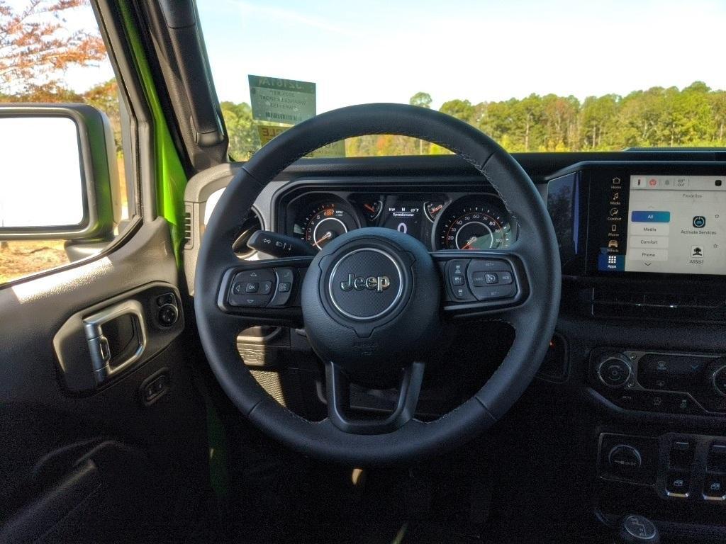 used 2025 Jeep Wrangler car, priced at $33,396