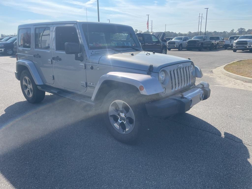 used 2017 Jeep Wrangler Unlimited car, priced at $18,290