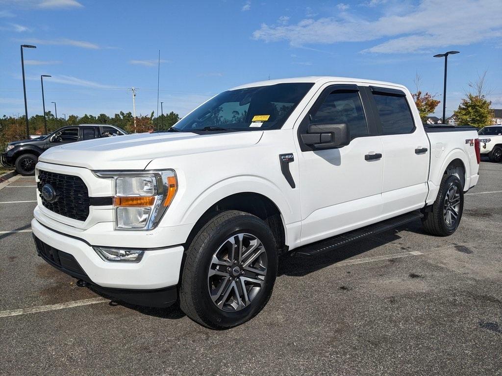 used 2021 Ford F-150 car, priced at $29,168