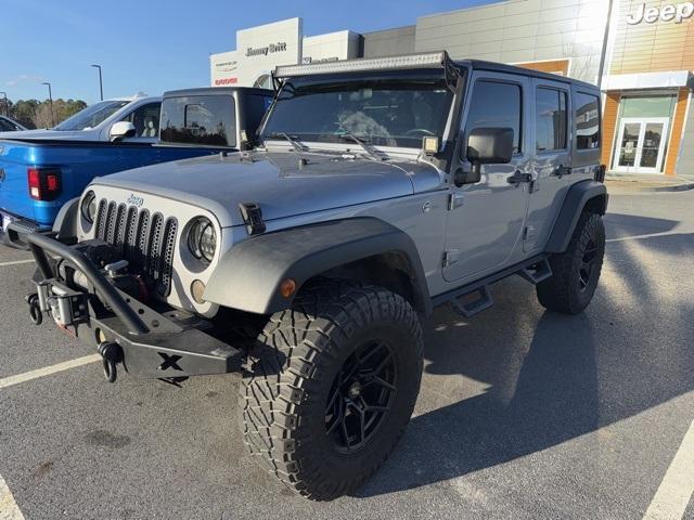 used 2016 Jeep Wrangler Unlimited car, priced at $20,977