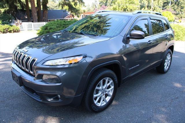 used 2014 Jeep Cherokee car, priced at $8,799