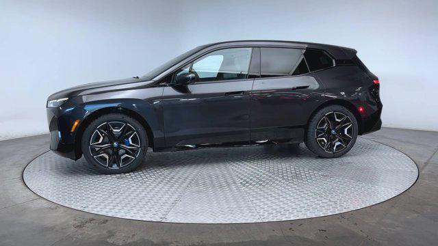 new 2025 BMW iX car, priced at $97,545