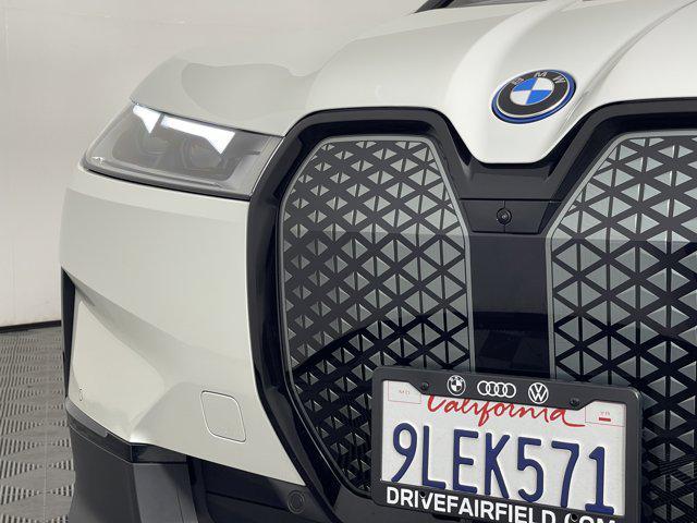 used 2024 BMW iX car, priced at $62,500