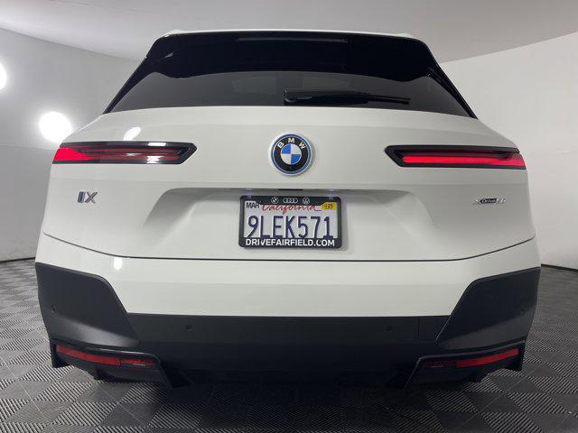 used 2024 BMW iX car, priced at $62,500