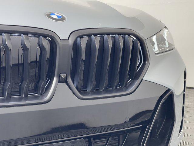 new 2025 BMW X6 car, priced at $84,285