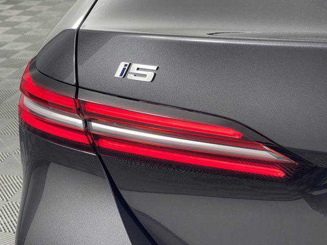 used 2024 BMW i5 car, priced at $54,888