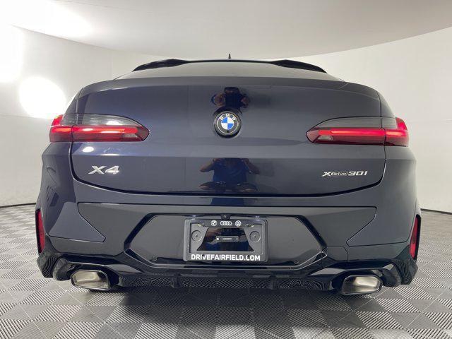 new 2025 BMW X4 car, priced at $64,100