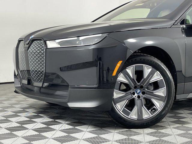 new 2025 BMW iX car, priced at $92,075