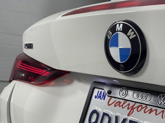 used 2025 BMW M4 car, priced at $89,588