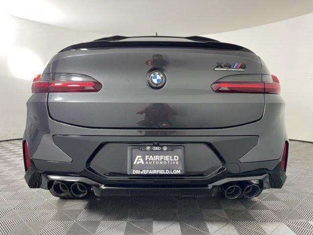 new 2025 BMW X4 M car, priced at $93,315