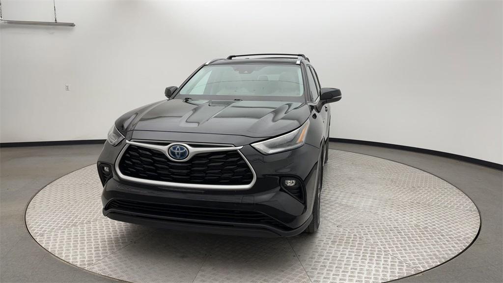 used 2021 Toyota Highlander Hybrid car, priced at $35,128