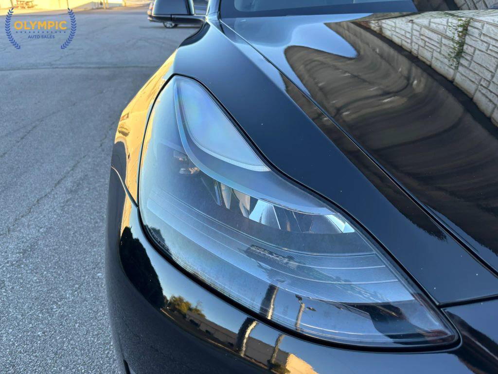 used 2022 Tesla Model 3 car, priced at $20,725