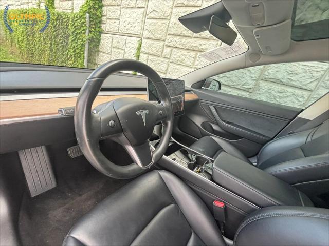 used 2018 Tesla Model 3 car, priced at $16,800