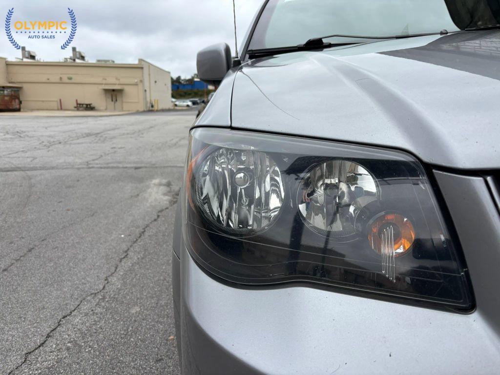 used 2018 Dodge Grand Caravan car, priced at $13,995