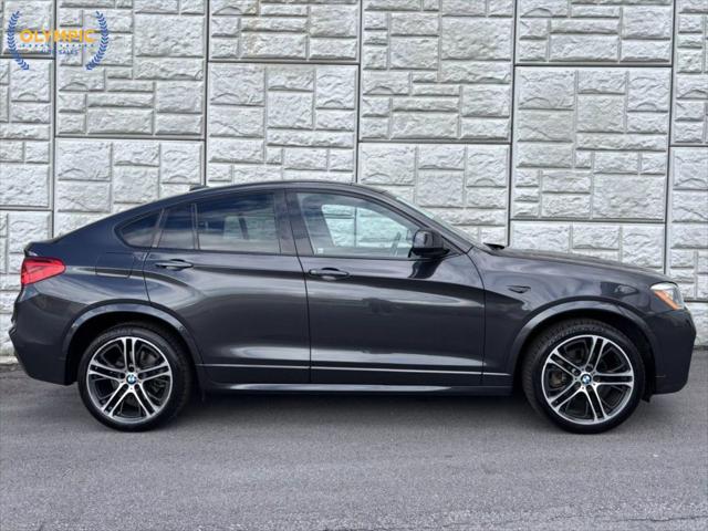 used 2015 BMW X4 car, priced at $14,970