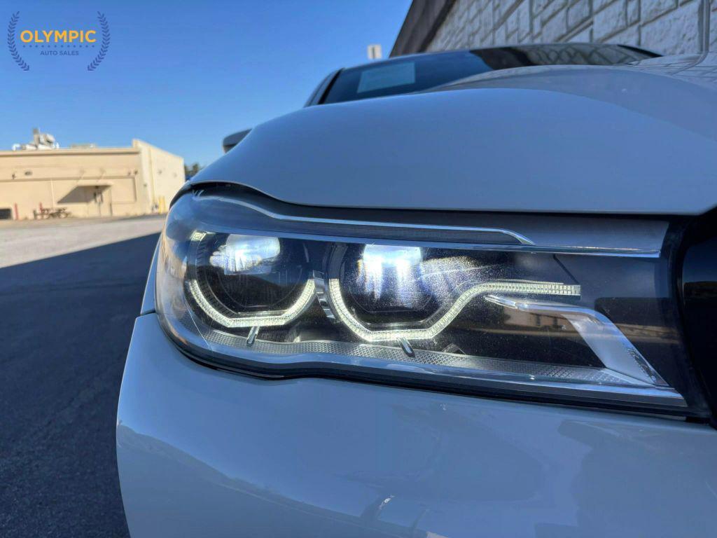 used 2016 BMW 740 car, priced at $18,400