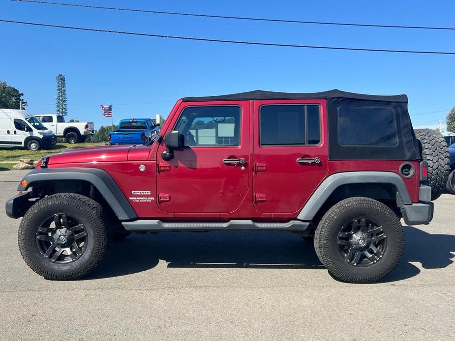 used 2013 Jeep Wrangler Unlimited car, priced at $13,277