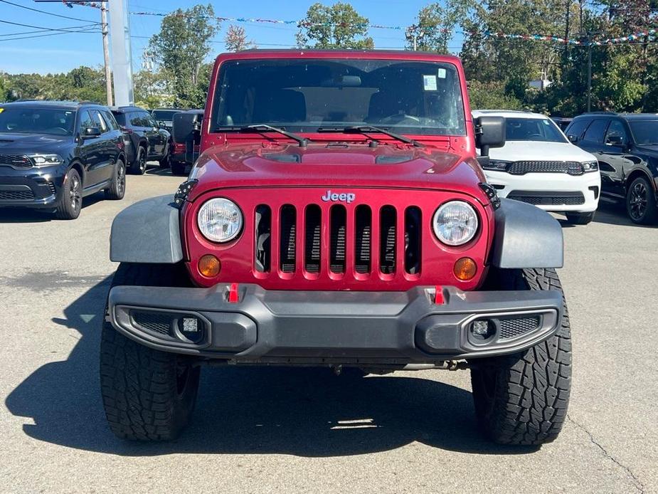 used 2013 Jeep Wrangler Unlimited car, priced at $13,277