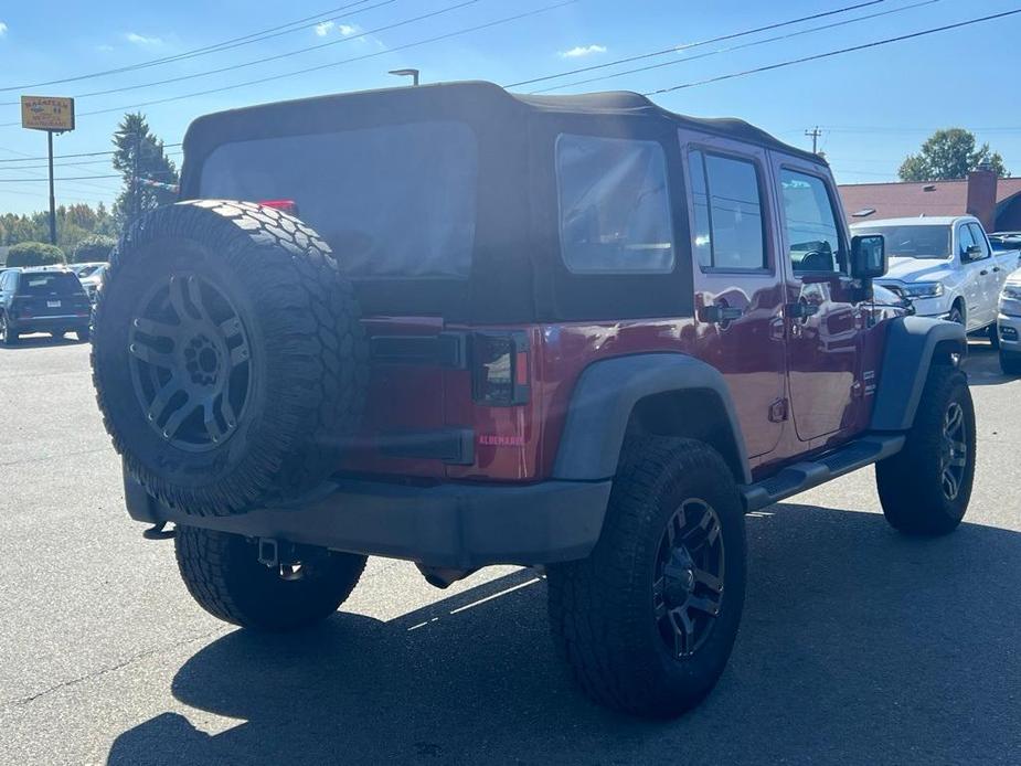 used 2013 Jeep Wrangler Unlimited car, priced at $13,277