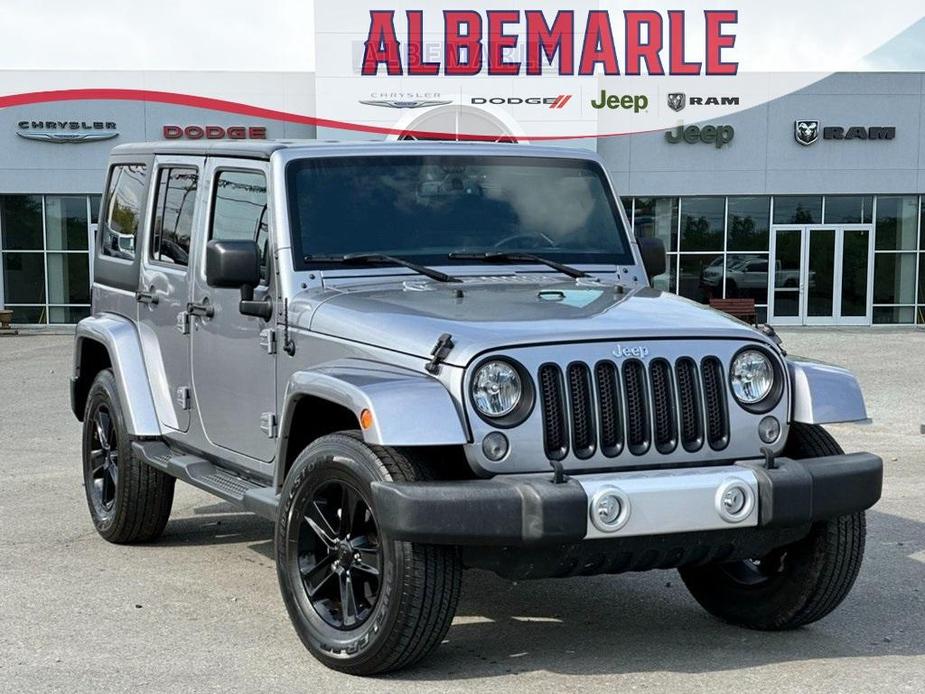 used 2015 Jeep Wrangler Unlimited car, priced at $22,277