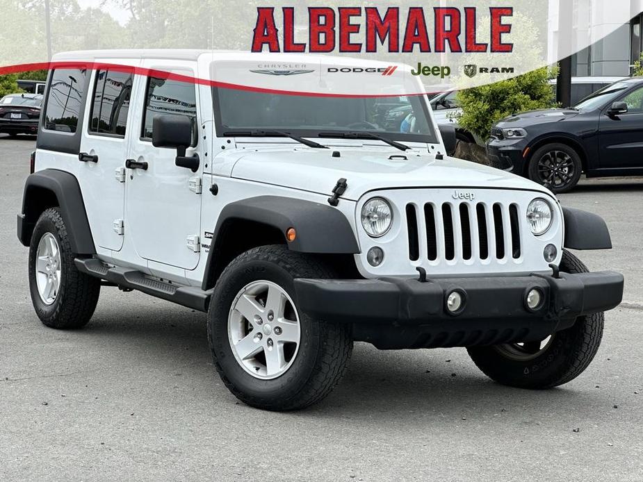 used 2015 Jeep Wrangler Unlimited car, priced at $16,277