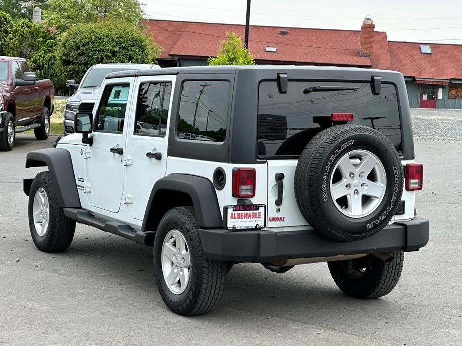 used 2015 Jeep Wrangler Unlimited car, priced at $16,277