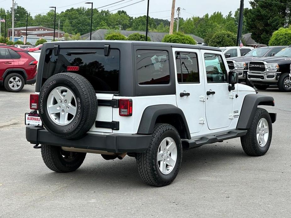 used 2015 Jeep Wrangler Unlimited car, priced at $15,277