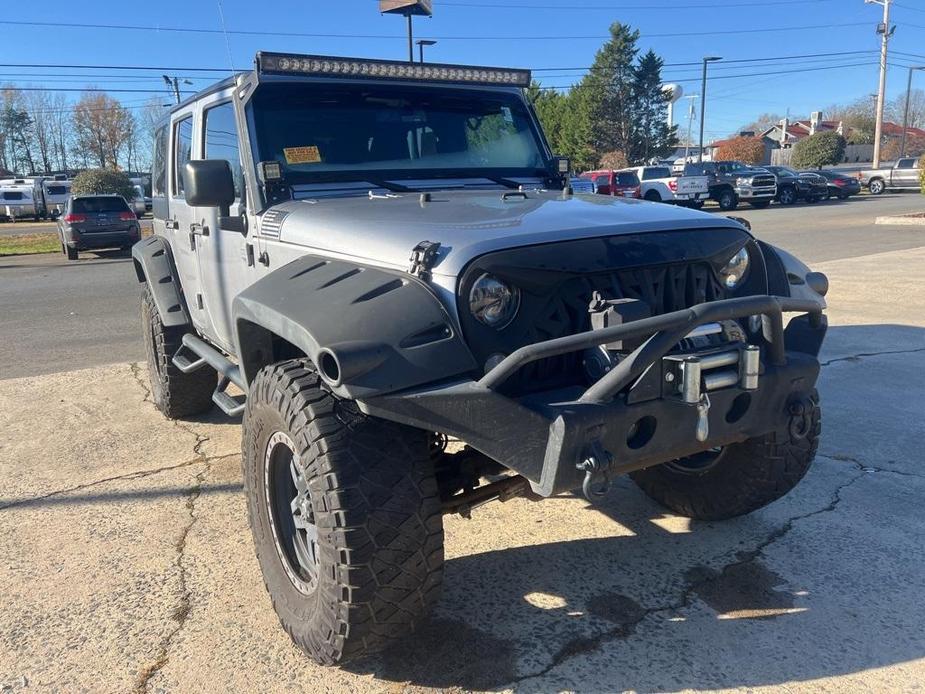 used 2014 Jeep Wrangler Unlimited car, priced at $15,277