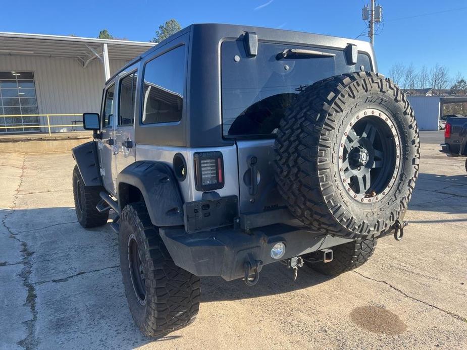 used 2014 Jeep Wrangler Unlimited car, priced at $15,277