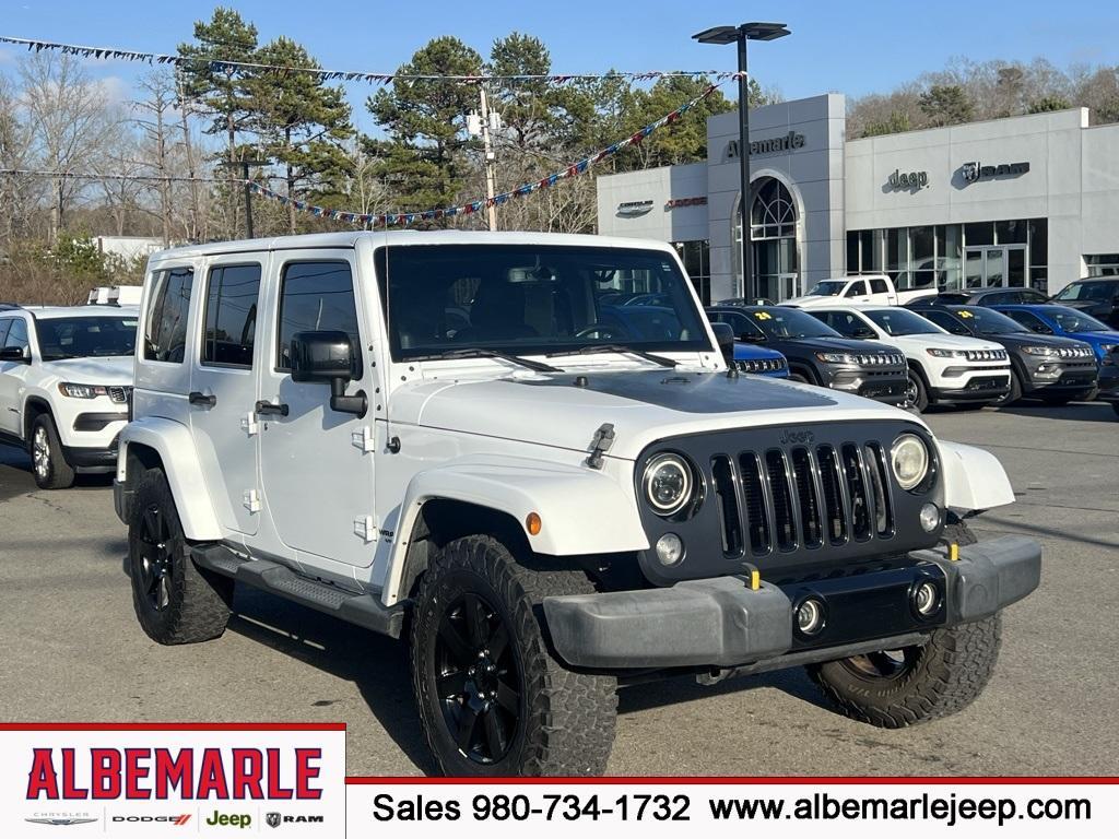 used 2014 Jeep Wrangler Unlimited car, priced at $14,277