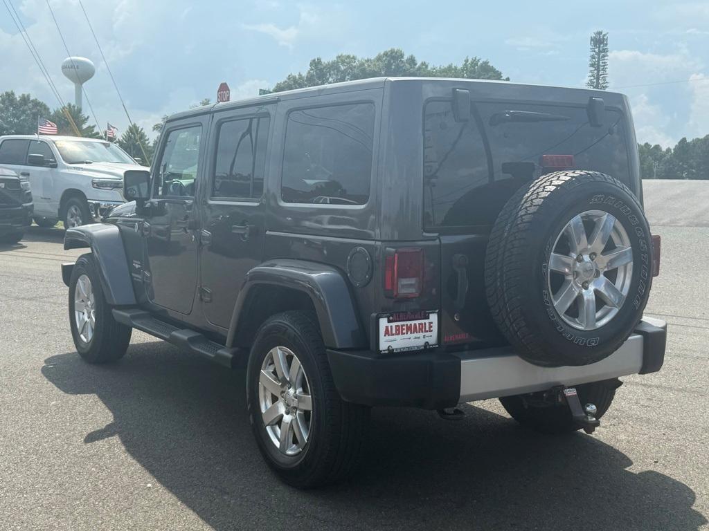 used 2014 Jeep Wrangler Unlimited car, priced at $16,277