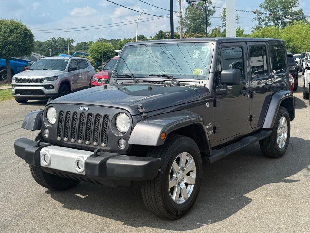 used 2014 Jeep Wrangler Unlimited car, priced at $16,277
