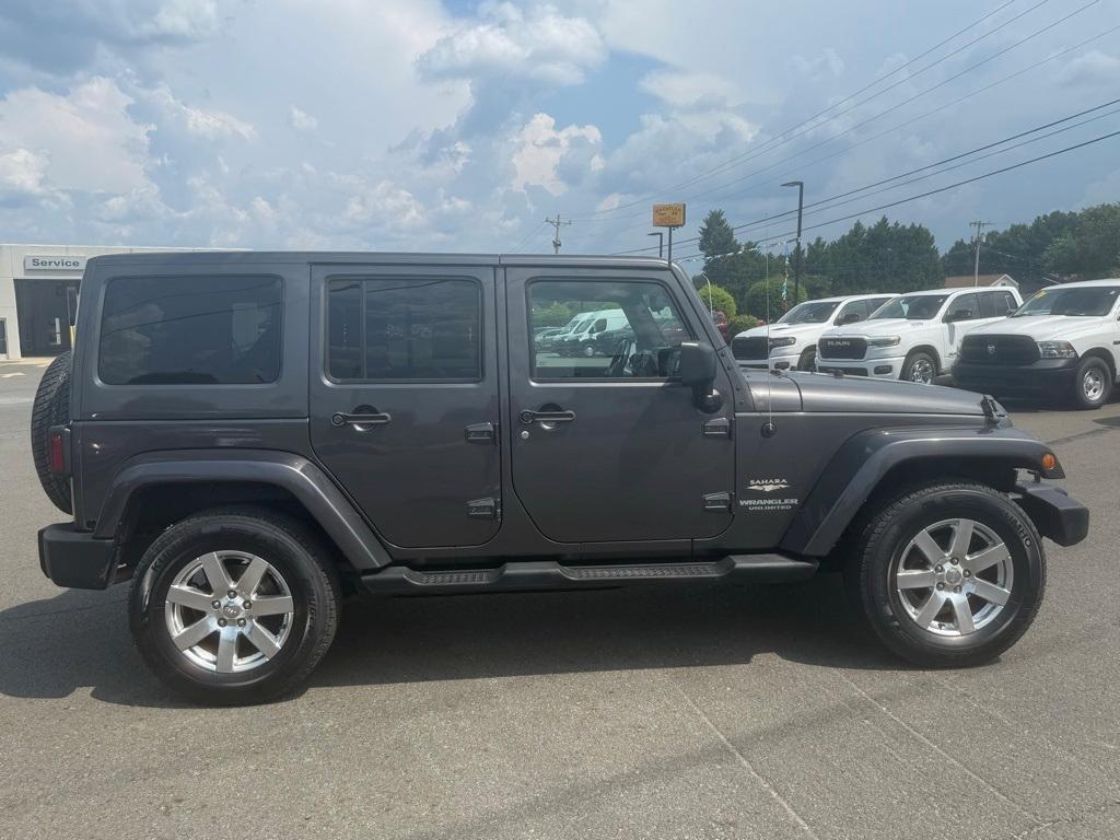used 2014 Jeep Wrangler Unlimited car, priced at $16,277