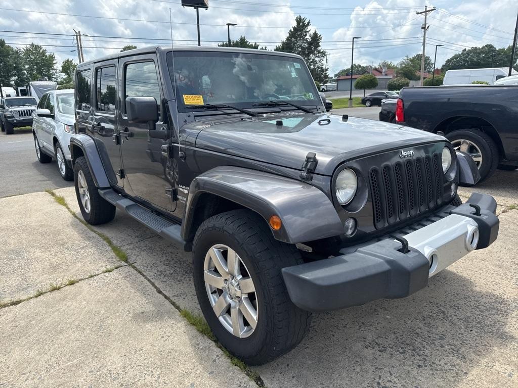 used 2014 Jeep Wrangler Unlimited car, priced at $16,277