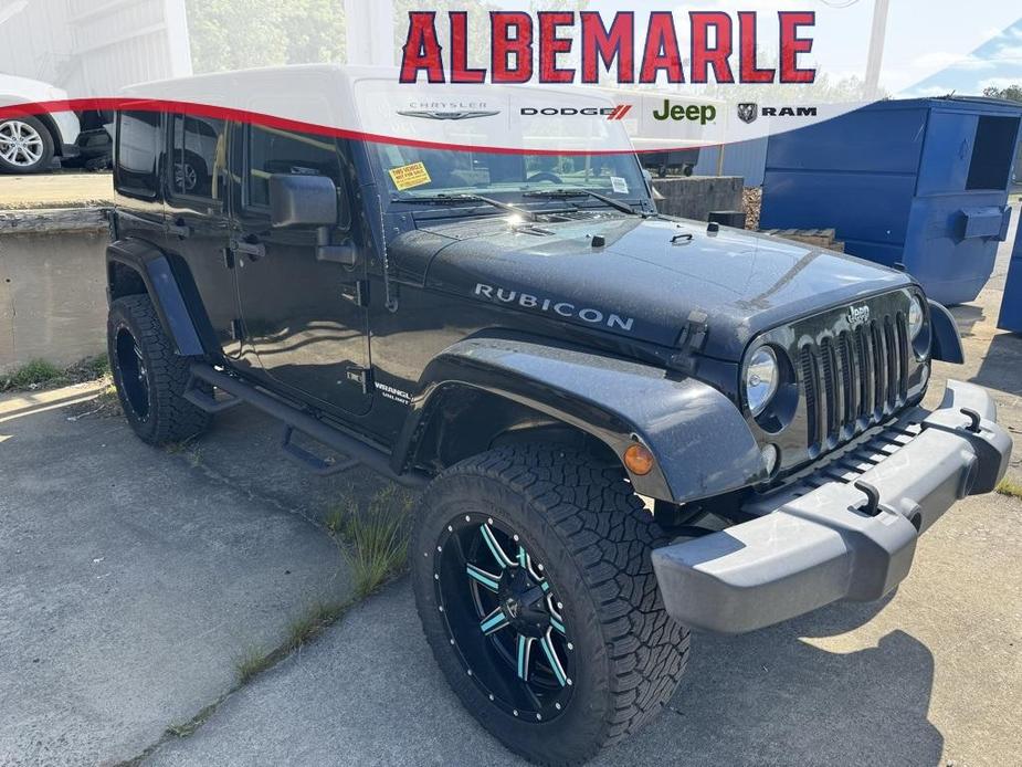 used 2015 Jeep Wrangler Unlimited car, priced at $24,777