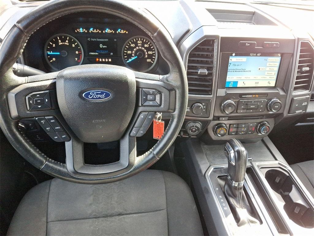 used 2018 Ford F-150 car, priced at $26,188