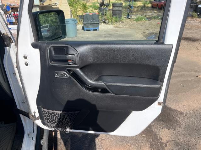 used 2015 Jeep Wrangler Unlimited car, priced at $20,874