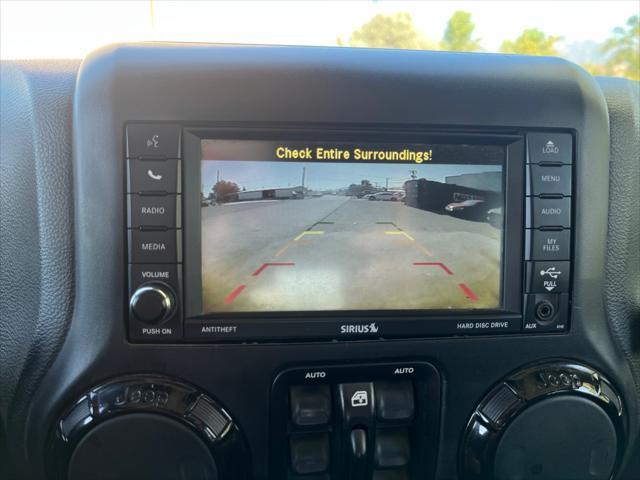 used 2015 Jeep Wrangler Unlimited car, priced at $20,874