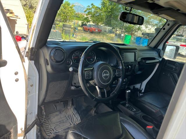 used 2015 Jeep Wrangler Unlimited car, priced at $20,874