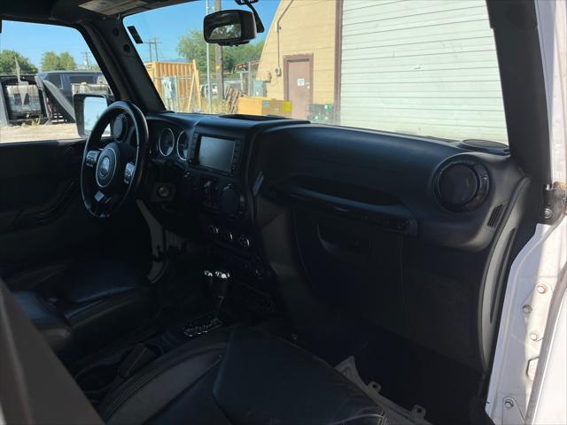 used 2015 Jeep Wrangler Unlimited car, priced at $20,874